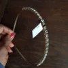 Gold-plated metal hair band with enclosed silver beads