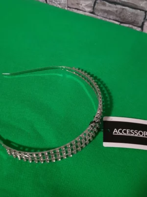 Triple arched silver metal hair band with enclosed shiny stones